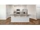 Modern kitchen features white cabinets, stainless steel appliances, granite countertops, and a kitchen island at 6161 Helens Rest Ln, Lincolnton, NC 28092