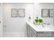 Bathroom featuring a double sink vanity with a white countertop, grey cabinets, and white hexagon tile floor at 6165 Helens Rest Ln, Lincolnton, NC 28092