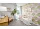 Bedroom featuring a crib, patterned wallpaper, carpeted floor, modern curtains, and a window view at 6165 Helens Rest Ln, Lincolnton, NC 28092