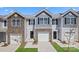 Charming townhomes with stone accents, attached garages and well-maintained lawns at 6165 Helens Rest Ln, Lincolnton, NC 28092