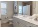 Well-lit bathroom with a modern vanity and decorative accents at 6231 Wakehurst Rd, Charlotte, NC 28226