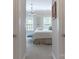 Bright bedroom with windows and a chandelier at 6231 Wakehurst Rd, Charlotte, NC 28226