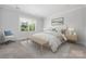 Cozy main bedroom with a queen-sized bed and neutral decor at 6272 Raven Rock Dr, Denver, NC 28037