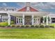 Inviting outdoor patio area with a stone fireplace, pergola, and comfortable seating for relaxing at 6272 Raven Rock Dr, Denver, NC 28037