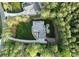 Aerial view of property featuring a fire pit, garden, and circular driveway at 7351 Bay Cove Ct, Denver, NC 28037
