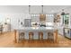 Spacious kitchen with a large island, white cabinets, and modern appliances at 7351 Bay Cove Ct, Denver, NC 28037