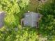 Aerial view of the property showcasing the roof, deck, and surrounding greenery at 741 Bermuda Ave, Gastonia, NC 28054