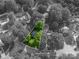 Aerial view with property lines of the home surrounded by lush green trees in a serene neighborhood at 741 Bermuda Ave, Gastonia, NC 28054