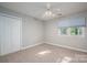 Neutral bedroom features carpet, ceiling fan and double window for great natural light and ventilation at 741 Bermuda Ave, Gastonia, NC 28054