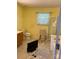 Bathroom featuring a toilet, sink with wooden cabinets, shower, and a window at 7505 Conifer Cir, Indian Trail, NC 28079
