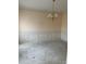 Spacious dining room featuring wainscoting and a classic chandelier fixture at 7505 Conifer Cir, Indian Trail, NC 28079