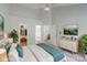 Spacious main bedroom featuring vaulted ceiling, ceiling fan, ensuite bathroom and walk-in closet at 7810 Trotter Rd, Charlotte, NC 28216