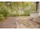 Backyard featuring a concrete patio and mature landscaping, great for entertaining at 8 Bolt Dr, Shelby, NC 28150
