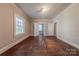 Bedroom featuring hardwood floors, a window for natural light, and neutral walls at 8 Bolt Dr, Shelby, NC 28150