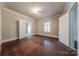 Bedroom featuring hardwood floors, a window for natural light, and neutral walls at 8 Bolt Dr, Shelby, NC 28150