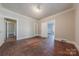 Bedroom featuring hardwood floors, a window for natural light, and neutral walls at 8 Bolt Dr, Shelby, NC 28150