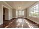 Elegant dining room featuring hardwood floors, a chandelier, and bright windows offering plenty of natural light at 8 Bolt Dr, Shelby, NC 28150