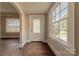 Bright entryway featuring hardwood floors, large windows, and decorative glass paneled front door at 8 Bolt Dr, Shelby, NC 28150