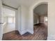 Entryway features hardwood floors, neutral walls, and archway leading to the rest of the home at 8 Bolt Dr, Shelby, NC 28150