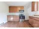 Kitchen featuring wooden cabinetry, countertops, and modern stainless steel appliances at 8 Bolt Dr, Shelby, NC 28150