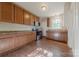 Well-lit kitchen featuring wooden cabinetry, countertops, and modern appliances at 8 Bolt Dr, Shelby, NC 28150