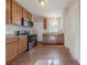 Well-lit kitchen featuring wooden cabinetry, countertops, and modern appliances at 8 Bolt Dr, Shelby, NC 28150