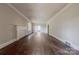 Bright living room with hardwood floors, neutral walls, fireplace, and ample natural light at 8 Bolt Dr, Shelby, NC 28150