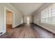 Spacious living room with hardwood floors, a fireplace, and many windows for natural light at 8 Bolt Dr, Shelby, NC 28150