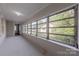 Sunroom with lots of windows and light overlooking the backyard at 8 Bolt Dr, Shelby, NC 28150