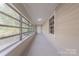 The bright sunroom has large windows and ample space for relaxing at 8 Bolt Dr, Shelby, NC 28150
