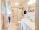 Bathroom with white fixtures, tile floor, and enclosed shower at 910 Surry Dr, Shelby, NC 28152