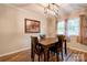 Bright dining room featuring hard wood floors and a modern light fixture at 910 Surry Dr, Shelby, NC 28152