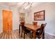 Beautiful dining area featuring a modern lighting fixture and seating for four people at 910 Surry Dr, Shelby, NC 28152