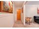 Inviting hallway featuring neutral paint, elegant chair rail and plush carpeting at 910 Surry Dr, Shelby, NC 28152