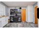 Functional kitchen featuring ample cabinet space, a door to the outside, and black storage at 910 Surry Dr, Shelby, NC 28152