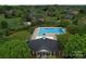 Aerial view showcasing the neighborhood pool and recreational amenities at 914 Olive Mill Ln, Matthews, NC 28104