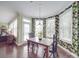 Charming breakfast nook featuring bright wallpaper, pendant lighting, and lots of natural light at 914 Olive Mill Ln, Matthews, NC 28104