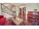 Open living space with grand staircase and pristine hardwood floors at 914 Olive Mill Ln, Matthews, NC 28104