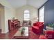 Inviting sitting area featuring a grand piano and comfortable seating at 914 Olive Mill Ln, Matthews, NC 28104