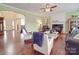 Spacious living room with hardwood floors, fireplace, and natural light at 914 Olive Mill Ln, Matthews, NC 28104
