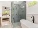 Bathroom boasts a glass shower and soaking tub at 933 Tennyson Dr, Charlotte, NC 28208