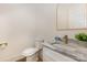 Modern bathroom features marble countertops and gold fixtures at 933 Tennyson Dr, Charlotte, NC 28208