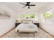 Primary bedroom with hardwood floors, a large window and a bench at 933 Tennyson Dr, Charlotte, NC 28208