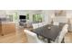 Inviting open-concept living area features a spacious kitchen, dining area, and comfortable seating for relaxation at 933 Tennyson Dr, Charlotte, NC 28208