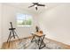 Office space with plenty of natural light and hardwood floors at 933 Tennyson Dr, Charlotte, NC 28208