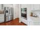 Modern kitchen with stainless steel appliances, marble countertops, and a built-in double oven at 10101 Bayart Way, Huntersville, NC 28078