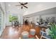 Open concept living area connects seamlessly to the sunroom and kitchen, enhancing natural light and space at 10101 Bayart Way, Huntersville, NC 28078
