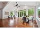 Charming sunroom with plenty of natural light and views of the lush greenery outside at 10101 Bayart Way, Huntersville, NC 28078
