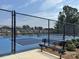 View of tennis courts with fencing and a bench, set in a community at 103 White Apple Way, Statesville, NC 28625