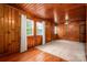 Bright bedroom with hardwood floors, wood paneling, and natural light, creating a cozy retreat at 1059 16Th Nw Ave, Hickory, NC 28601